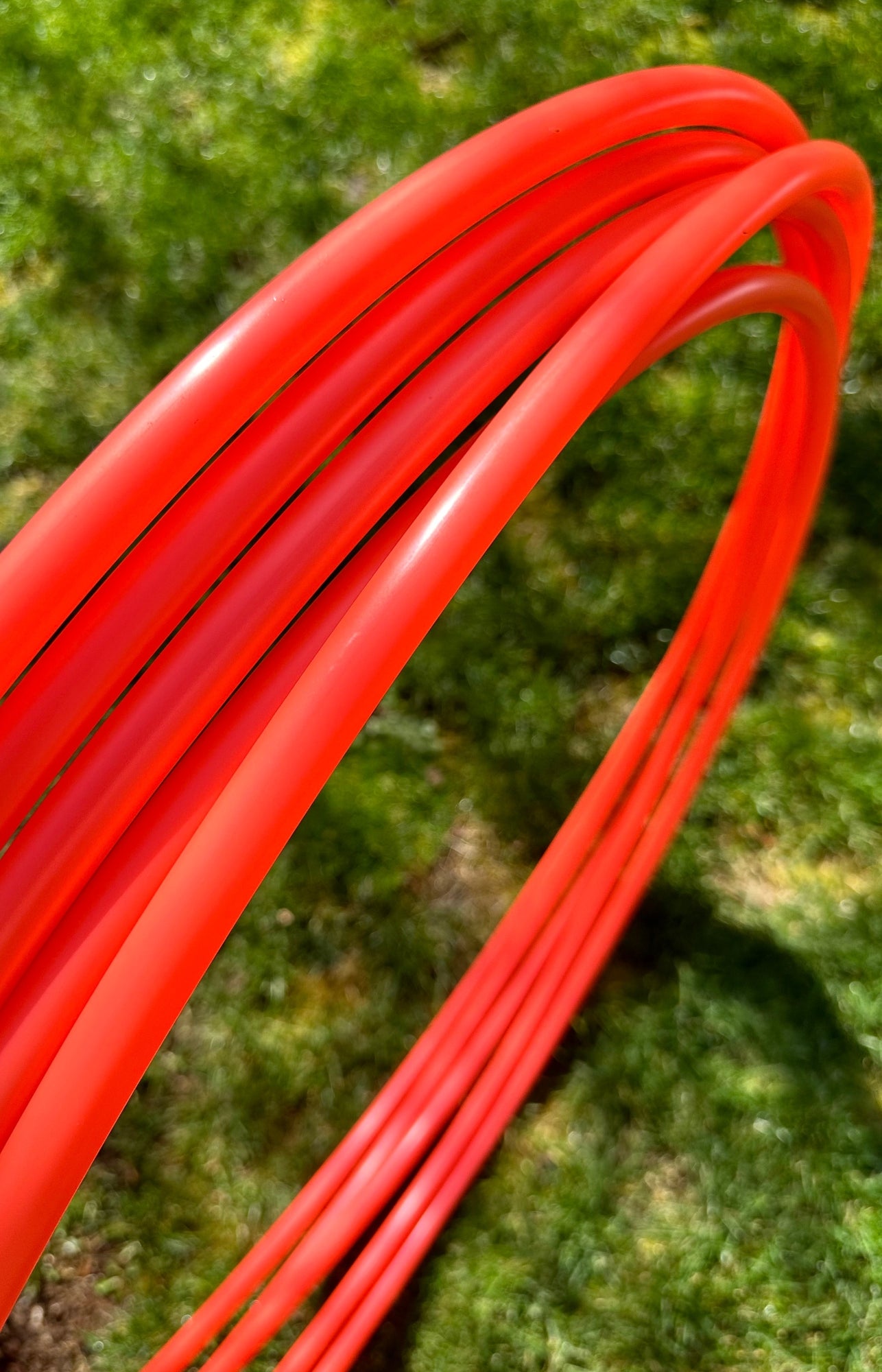 5/8 UV Coral Fire / Pele's Fire Colored Polypro Hoops