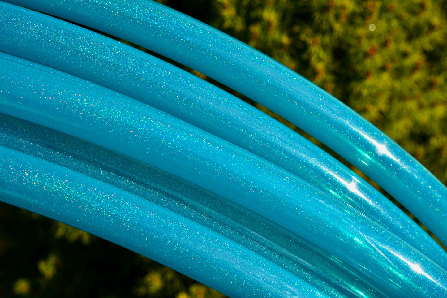 3/4 UV Turquoise Stardust Glitter Colored Polypro Hoops